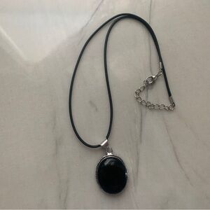 1890 Sleek Black Oval Pendant Necklace